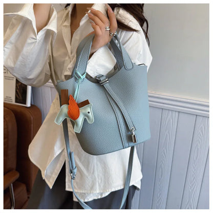 Popular and popular lychee patterned mother and child bucket bag for women, 2025 new casual retro handbag, casual commuting bag