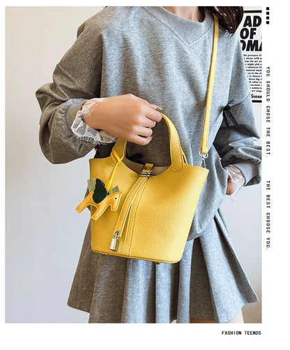 Popular and popular lychee patterned mother and child bucket bag for women, 2025 new casual retro handbag, casual commuting bag