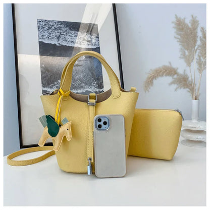 Popular and popular lychee patterned mother and child bucket bag for women, 2025 new casual retro handbag, casual commuting bag
