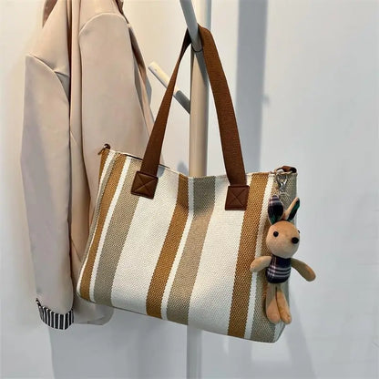 Tote Bag for Women Large Capacity Canvas Striped Shoulder Bag with Cute Pendant Commute Handbag Casual Versatile Crossbody Bag