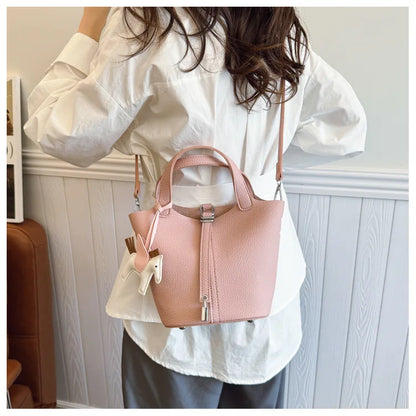 Popular and popular lychee patterned mother and child bucket bag for women, 2025 new casual retro handbag, casual commuting bag