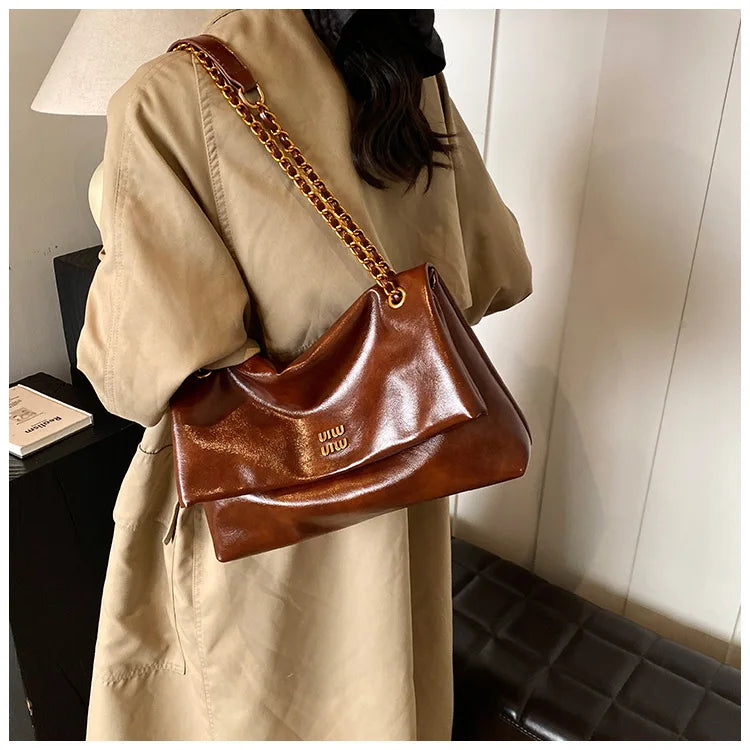 2025 Women‘s Bag Retro PU Leather Underarm Bag autumn and winter Large capacity Commuting Folded Chain Shoulder Bucket Tote Bag