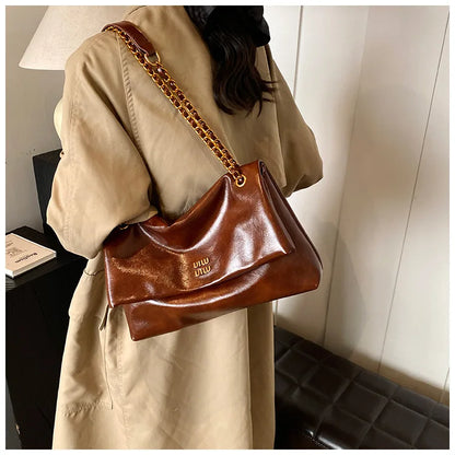 2025 Women‘s Bag Retro PU Leather Underarm Bag autumn and winter Large capacity Commuting Folded Chain Shoulder Bucket Tote Bag