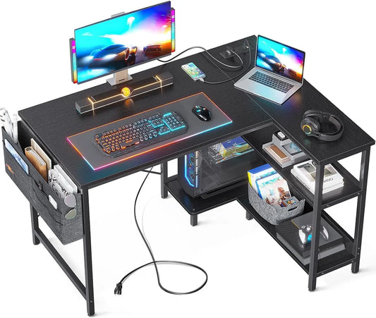 40 Inch L-Shaped Gaming Desk with Power Outlets, Reversible Shelves & PC Stand for Home Office, Black