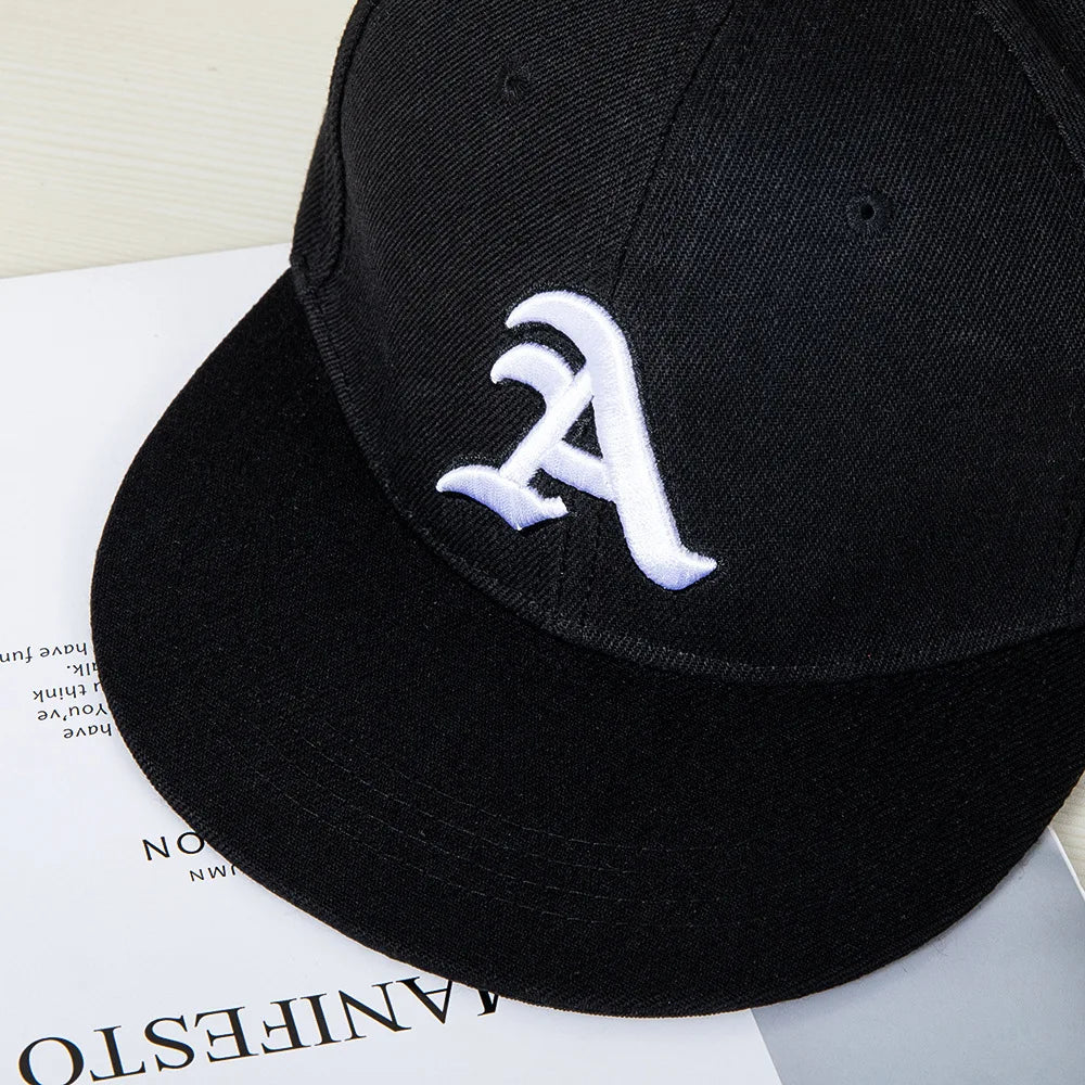 Hip-hop style baseball cap with a flat top, color patching, letter embroidery. Suitable for both women and men