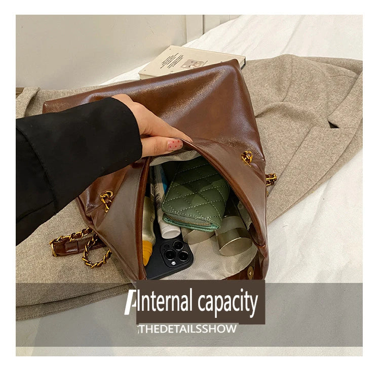 2025 Women‘s Bag Retro PU Leather Underarm Bag autumn and winter Large capacity Commuting Folded Chain Shoulder Bucket Tote Bag