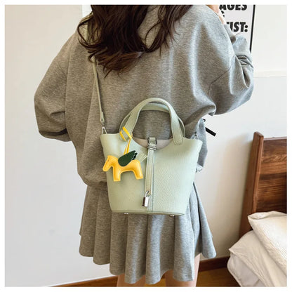 Popular and popular lychee patterned mother and child bucket bag for women, 2025 new casual retro handbag, casual commuting bag
