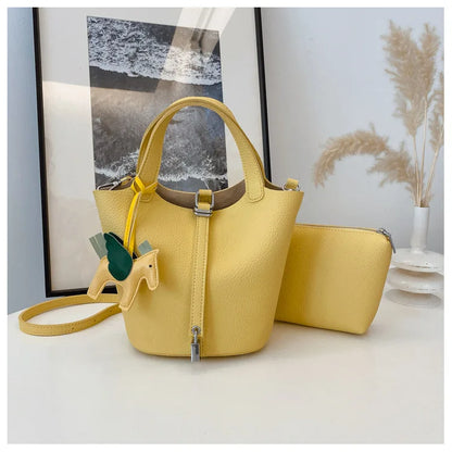 Popular and popular lychee patterned mother and child bucket bag for women, 2025 new casual retro handbag, casual commuting bag