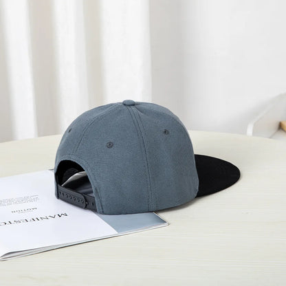 Hip-hop style baseball cap with a flat top, color patching, letter embroidery. Suitable for both women and men