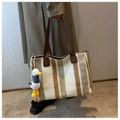 Tote Bag for Women Large Capacity Canvas Striped Shoulder Bag with Cute Pendant Commute Handbag Casual Versatile Crossbody Bag