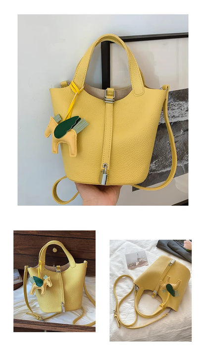 Popular and popular lychee patterned mother and child bucket bag for women, 2025 new casual retro handbag, casual commuting bag