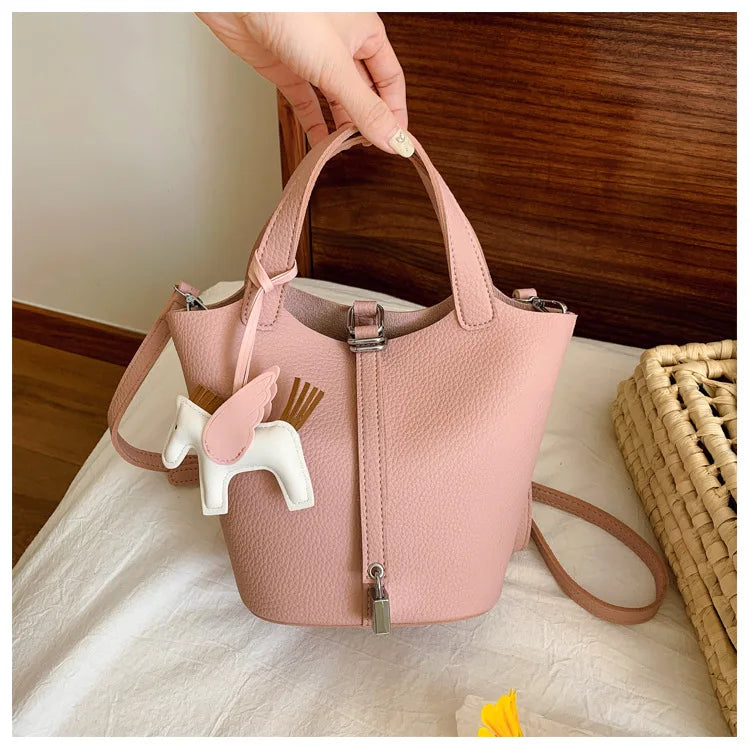 Popular and popular lychee patterned mother and child bucket bag for women, 2025 new casual retro handbag, casual commuting bag