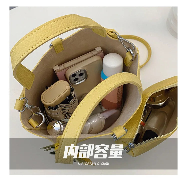 Popular and popular lychee patterned mother and child bucket bag for women, 2025 new casual retro handbag, casual commuting bag