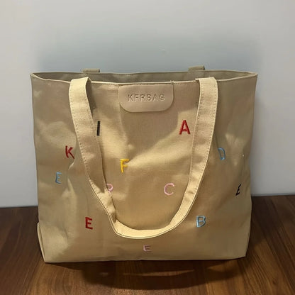 Women's large-capacity canvas handbag - fashionable embroidery letter design, green shoulder handbag