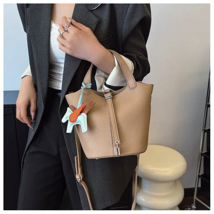 Popular and popular lychee patterned mother and child bucket bag for women, 2025 new casual retro handbag, casual commuting bag