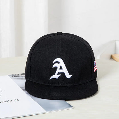 Hip-hop style baseball cap with a flat top, color patching, letter embroidery. Suitable for both women and men