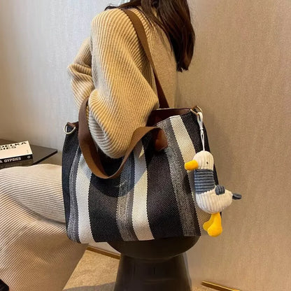 Tote Bag for Women Large Capacity Canvas Striped Shoulder Bag with Cute Pendant Commute Handbag Casual Versatile Crossbody Bag