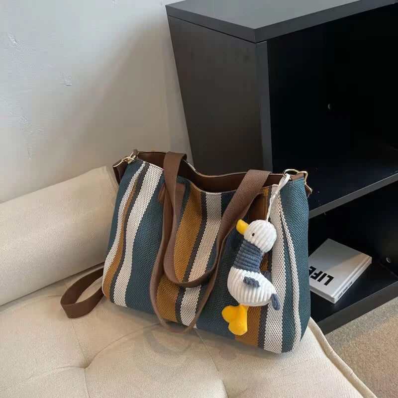 Tote Bag for Women Large Capacity Canvas Striped Shoulder Bag with Cute Pendant Commute Handbag Casual Versatile Crossbody Bag