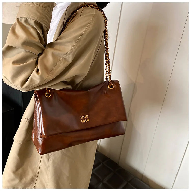 2025 Women‘s Bag Retro PU Leather Underarm Bag autumn and winter Large capacity Commuting Folded Chain Shoulder Bucket Tote Bag