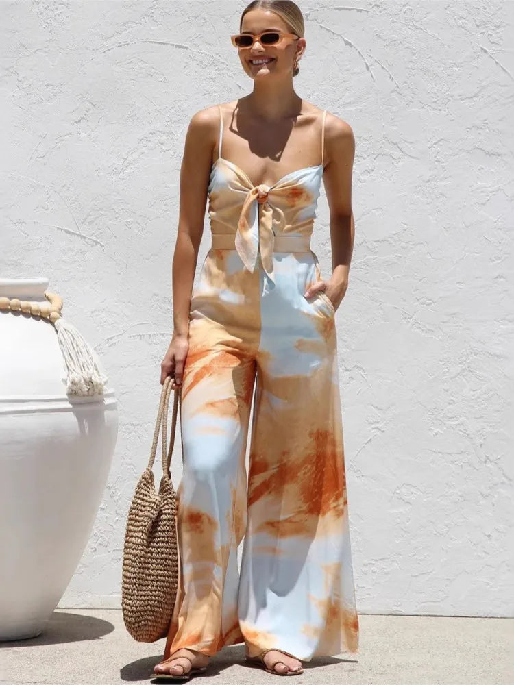 Summer New Print Spaghetti Strap jumpsuits Women Sexy Low Cut Bowknot Bowknot High Waist Wide Leg Jumpsuit Vacation Style Female