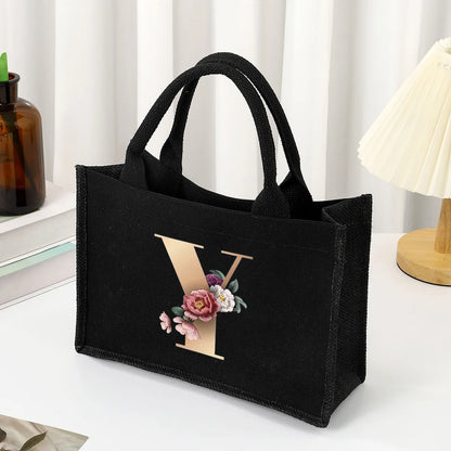 Black hand-held canvas bag, 26 letter printed women's handbag, large capacity portable leisure beach bag, indoor waterproof