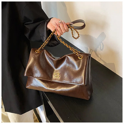 2025 Women‘s Bag Retro PU Leather Underarm Bag autumn and winter Large capacity Commuting Folded Chain Shoulder Bucket Tote Bag