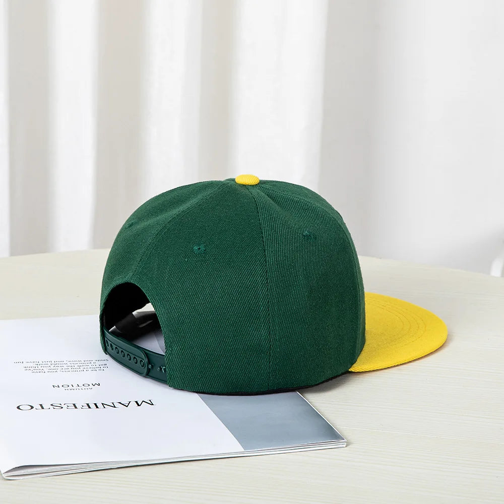 Hip-hop style baseball cap with a flat top, color patching, letter embroidery. Suitable for both women and men