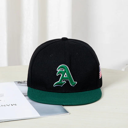 Hip-hop style baseball cap with a flat top, color patching, letter embroidery. Suitable for both women and men
