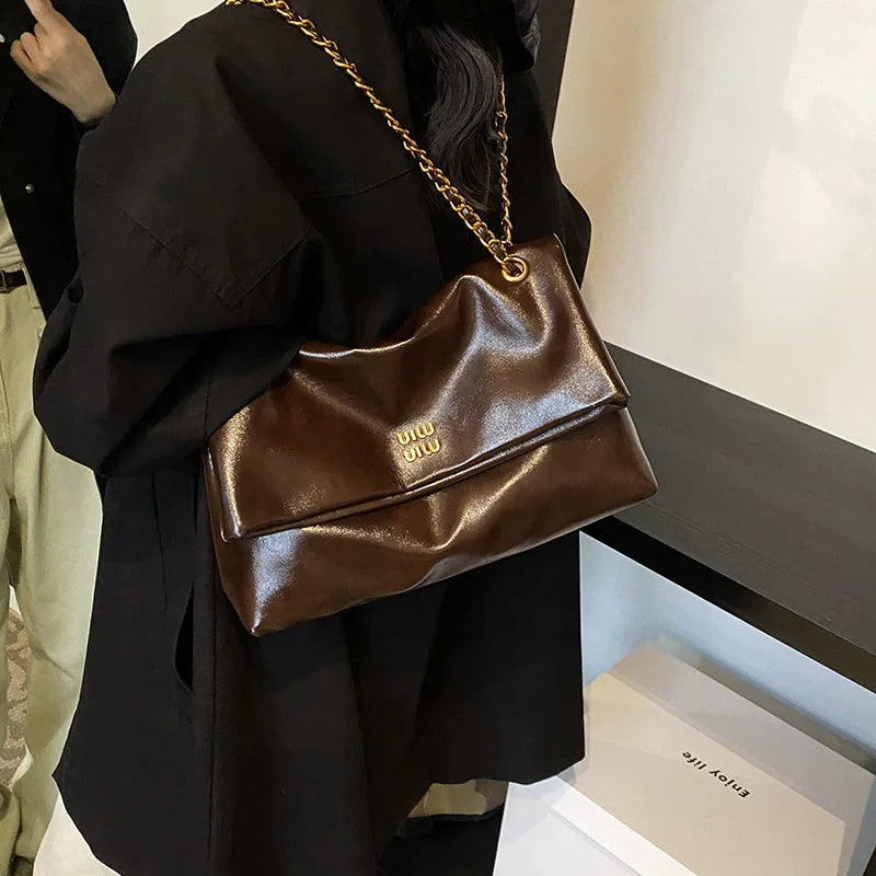 2025 Women‘s Bag Retro PU Leather Underarm Bag autumn and winter Large capacity Commuting Folded Chain Shoulder Bucket Tote Bag