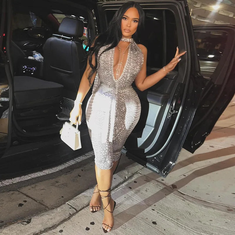 FAGADOER Sexy Python Print Patchwork Bodycon Jumpsuits Woman Halter Deep V-neck Backless Rompers Female Streetwear Overalls New