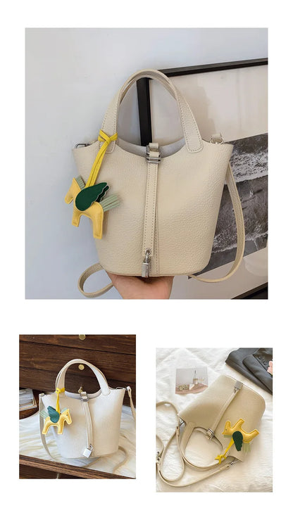 Popular and popular lychee patterned mother and child bucket bag for women, 2025 new casual retro handbag, casual commuting bag