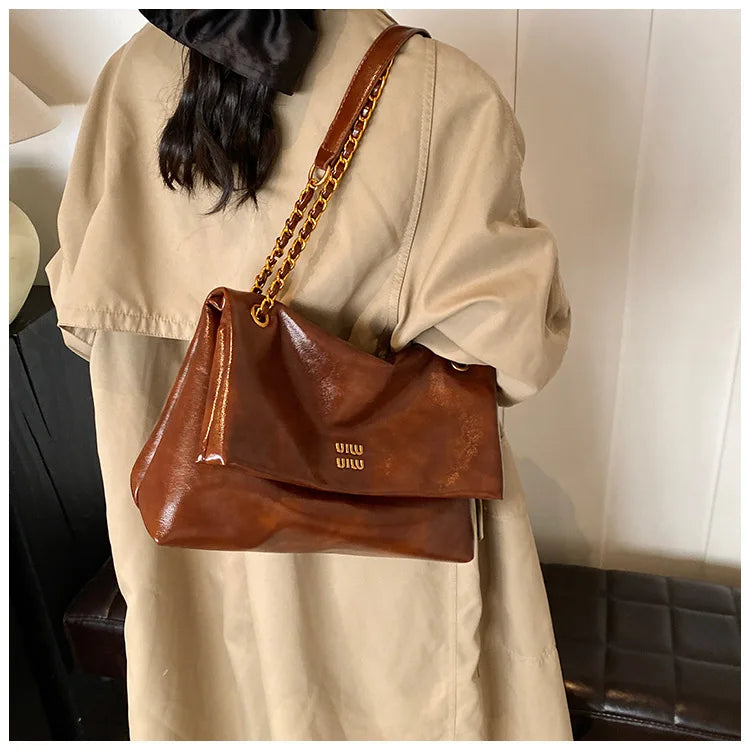 2025 Women‘s Bag Retro PU Leather Underarm Bag autumn and winter Large capacity Commuting Folded Chain Shoulder Bucket Tote Bag