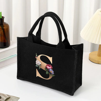 Black hand-held canvas bag, 26 letter printed women's handbag, large capacity portable leisure beach bag, indoor waterproof