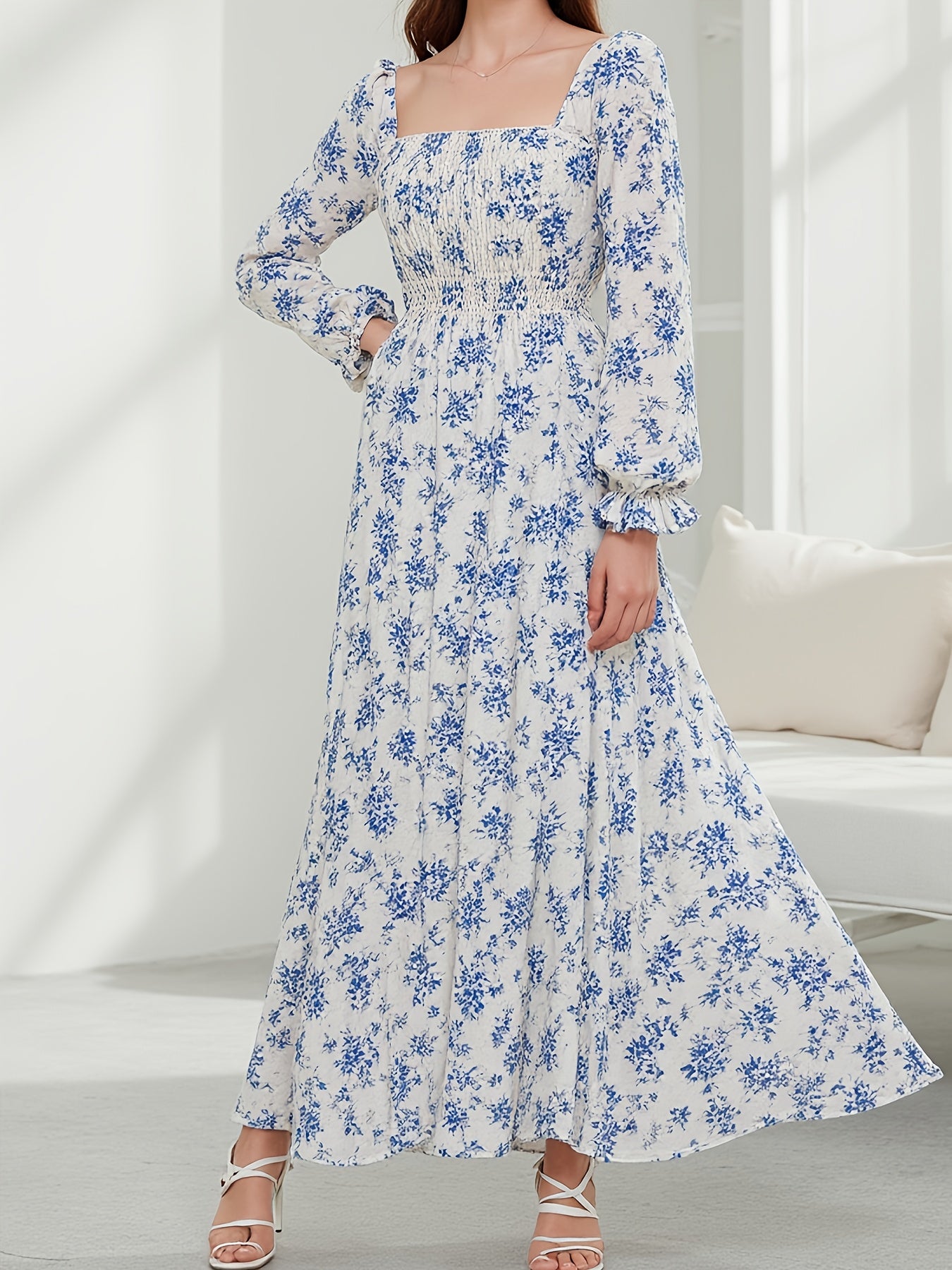 Elegant Long Dress for Women Featuring a Blue Floral Print, Side Slit, Square Neckline, And Ruffled Hem with Long Puff Sleeves, Perfect for Spring, Summer, And Autumn. This French Waist-Cinching Design Is Ideal for Beach Outi