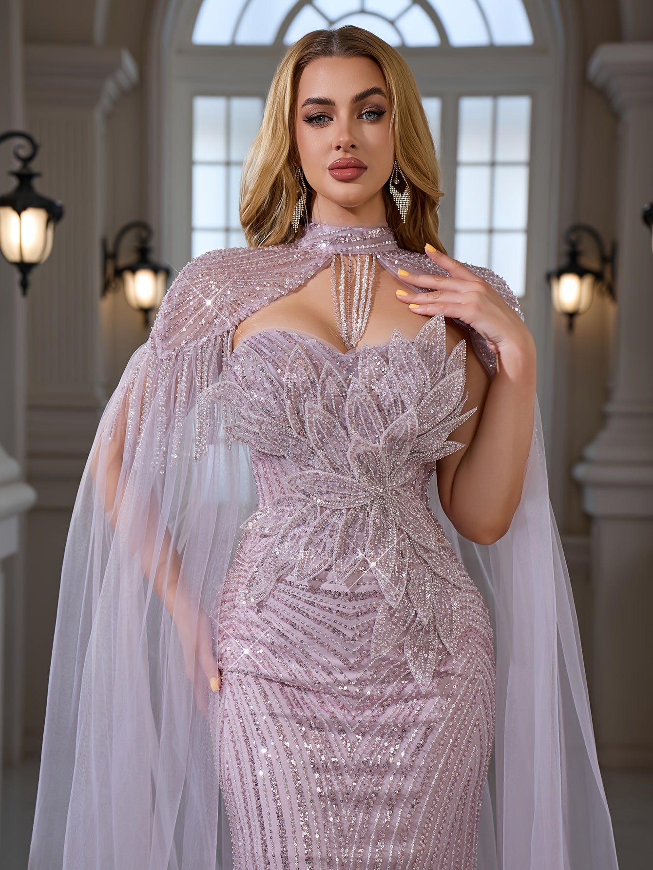 An Elegant And Sexy Evening Gown Featuring a High Neckline, 3D Petal Appliqués, And Flowing Tassels, Adorned with Sequins And Lace on The Bodice