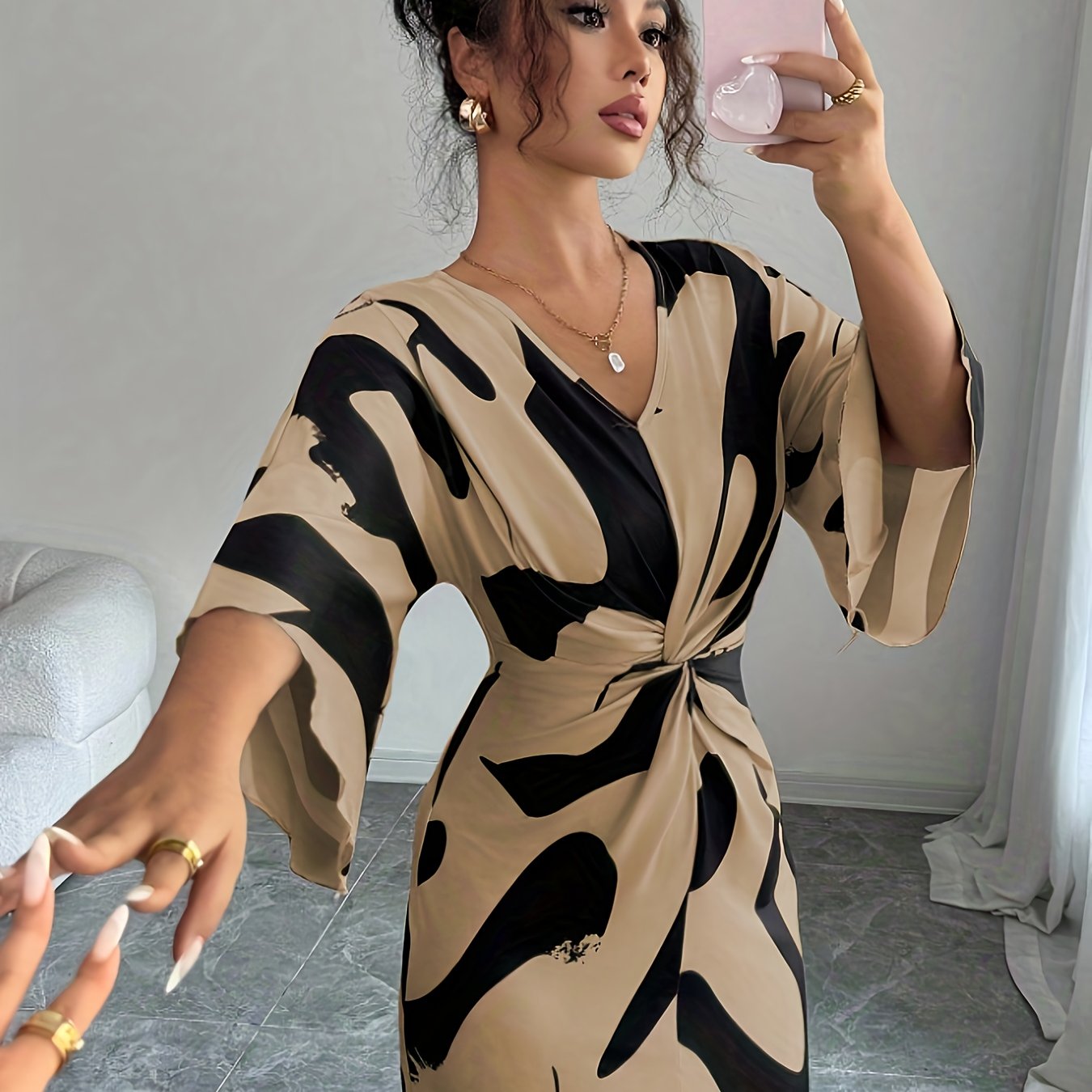 This Elegant Midi Dress Features a Unique Apricot Base Color with a Milk Digital Print, High-Stretch Fabric, a V-Neck, And a Stylish Waist Twist Design. Its Irregular Hem Adds a Niche Touch, Making It Perfect for High-End Aut