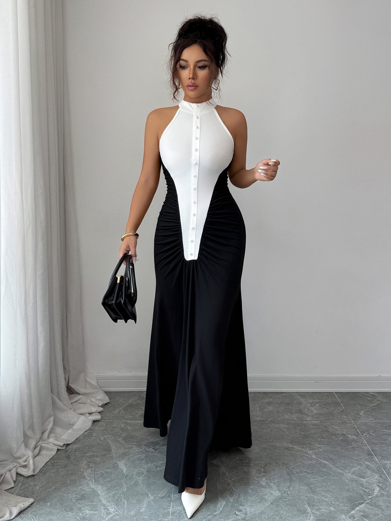 European Style Black White Spliced Maxi Dress | Halter Neck, Sleeveless, Pleated Skirt, Button Details, Elegant Wedding Guest Dress for Fall.