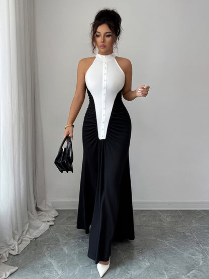 European Style Black White Spliced Maxi Dress | Halter Neck, Sleeveless, Pleated Skirt, Button Details, Elegant Wedding Guest Dress for Fall.