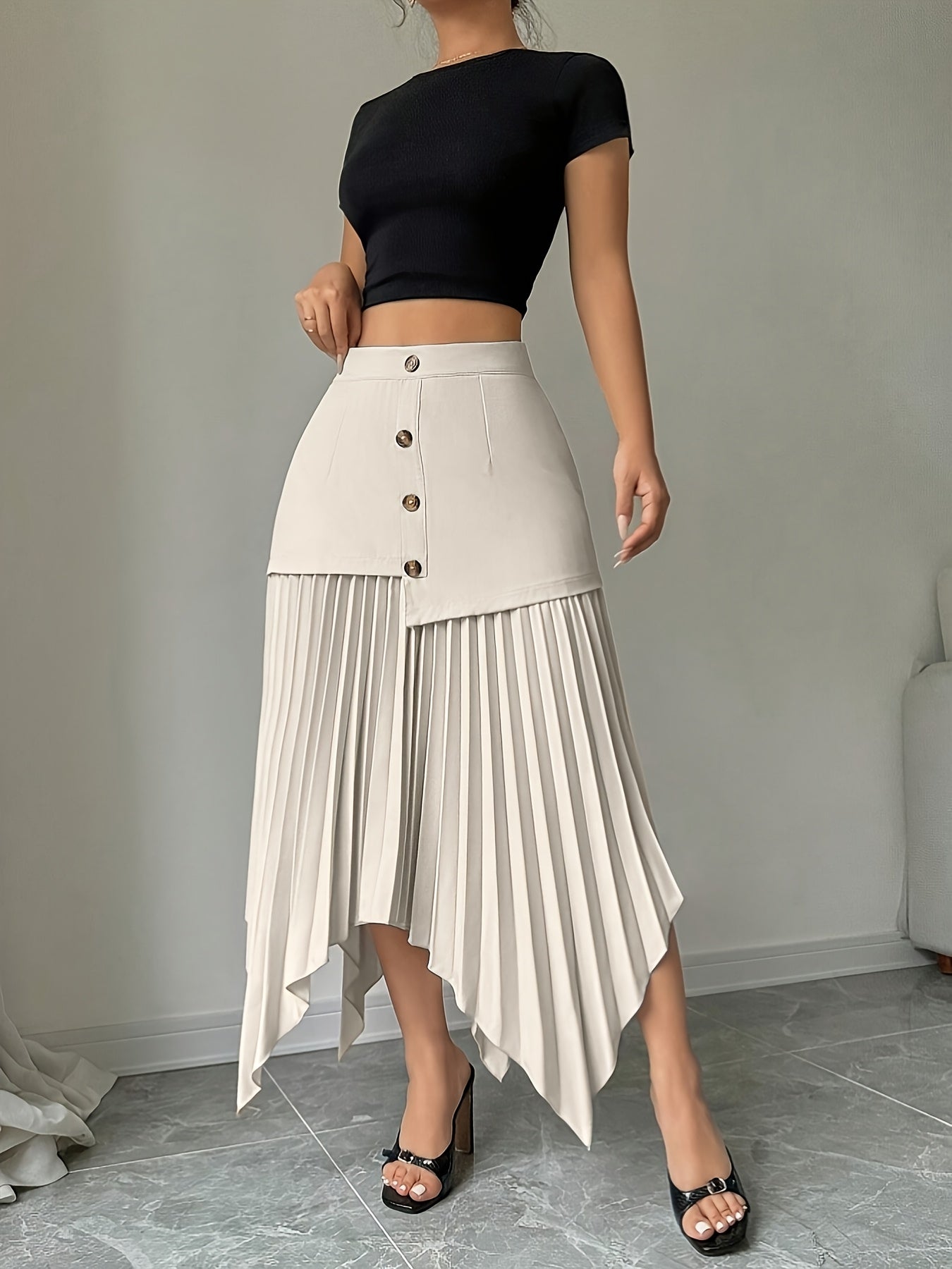 A Spring Season Skirt with an Asymmetrical Pleated Hem And Front Buttons, an Elegant Autumn Skirt with a Unique Button Closure And Pressed Pleats - Machine Washable for Casual And Formal Wear in Spring And Summer