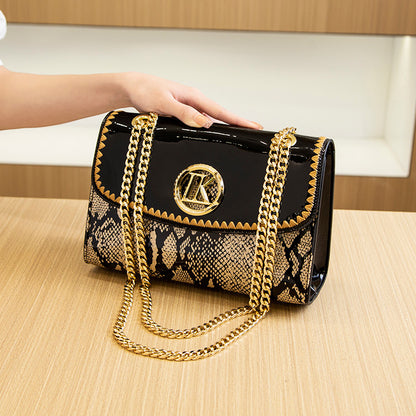 Stylish Black Snake Pattern Crossbody Bag for Women with Golden-Tone Hardware & Chain Strap - Elegant Glossy Finish, Zip Closure, Polyester Lining, Perfect for Casual or Formal Occasions