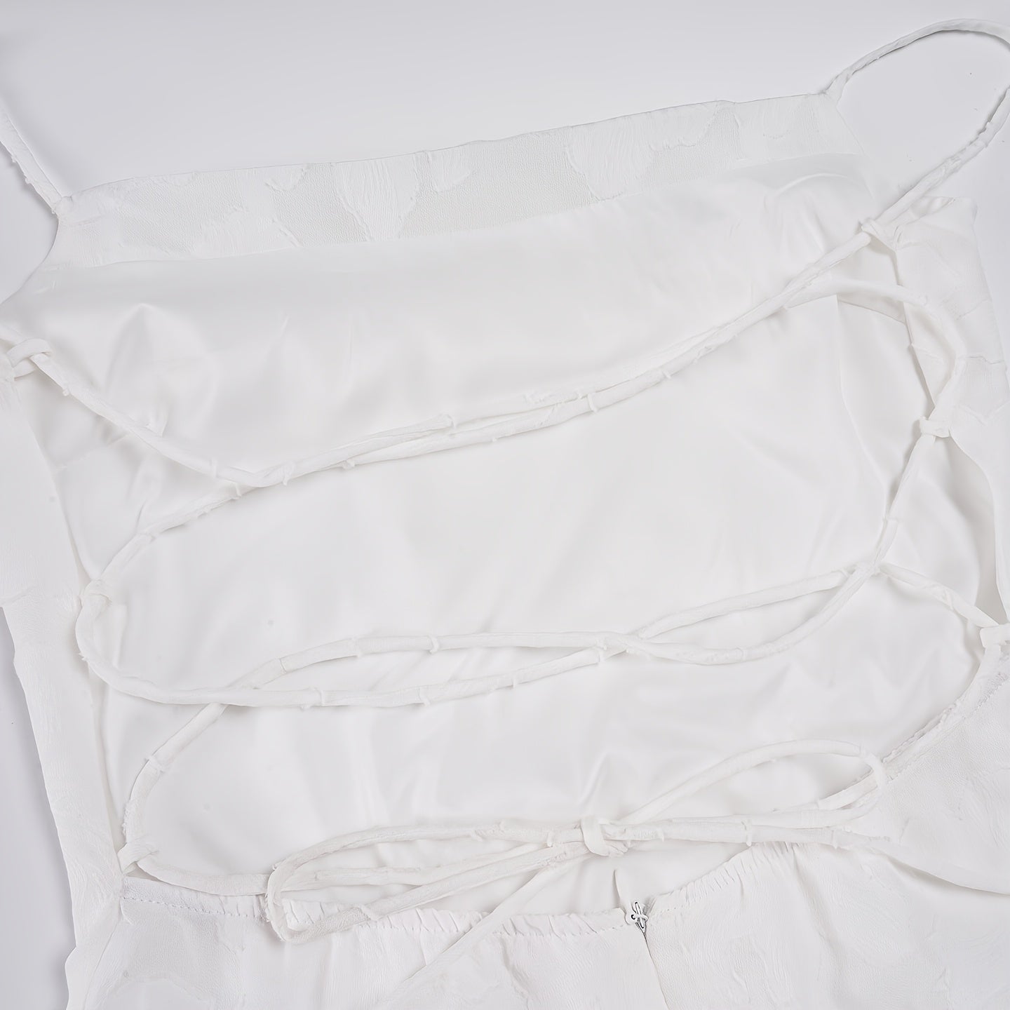Chic And Alluring White Lace Dress with a Backless Design, Perfect for Summer Evening Parties. This Waist-Cinching A-Line Dress Is Flattering And Ideal for Vacations