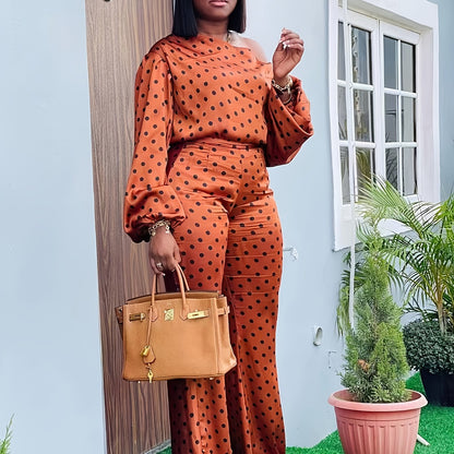 Casual Off-Shoulder Outfit for Women Featuring a Long-Sleeve Top And Loose-Fitting Long Pants with a Polka Dot Design.
